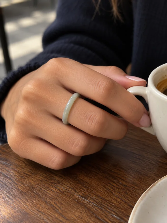 A jade ring worn while enjoying coffee